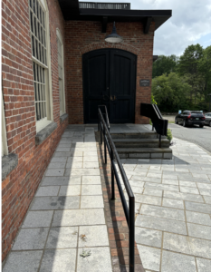 Ramp and main entrance with double doors